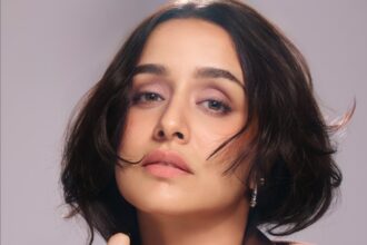 Shraddha Kapoor in a stylish blazer with a messy bun showcasing a playful CEO-inspired look