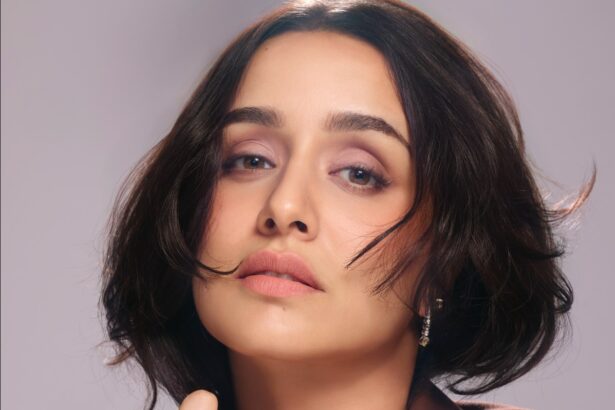 Shraddha Kapoor in a stylish blazer with a messy bun showcasing a playful CEO-inspired look