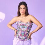 Wamiqa Gabbi wearing a lavender Sonaakshi Raaj ensemble with embroidered corset and butterfly hair clips