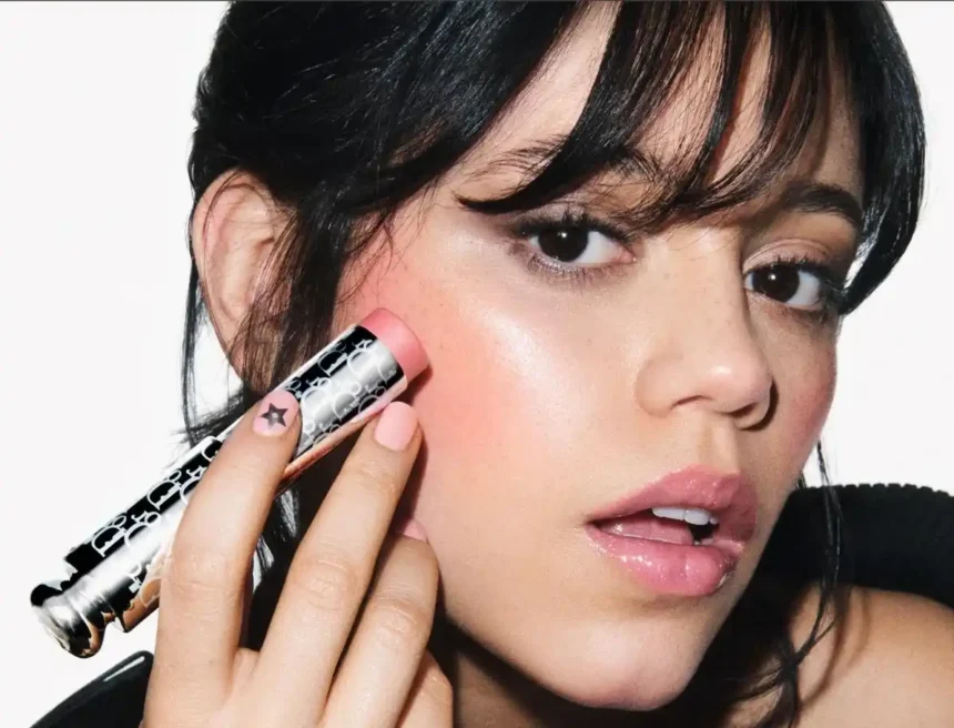 Jenna Ortega in Dior Beauty's makeup campaign with luminous skin and rosy cheeks