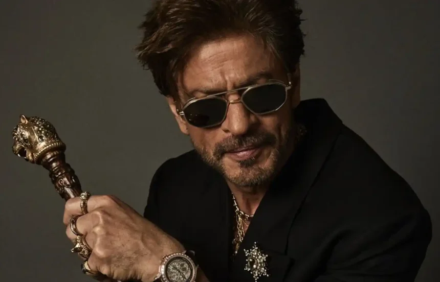 Shah Rukh Khan in a Sabyasachi ensemble at the Met Gala wearing layered jewellery and carrying a tiger-head cane