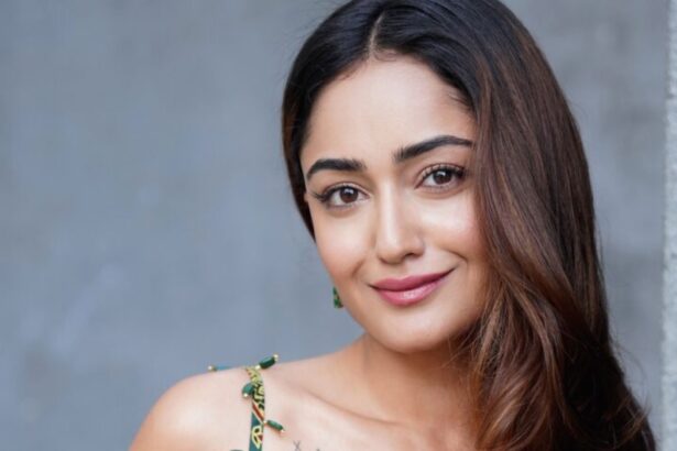 Tridha Choudhury in a vibrant green saree with a striking red border and embroidered blouse