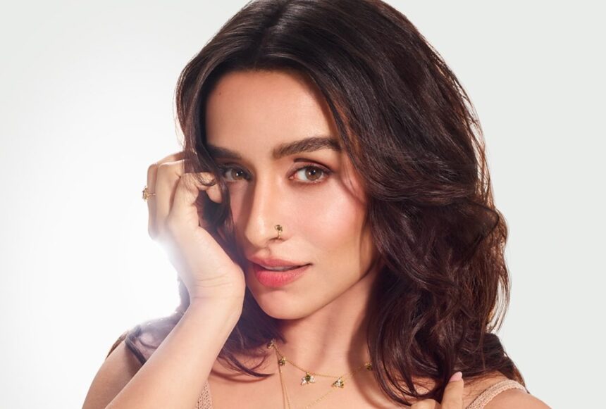 Shraddha Kapoor wearing a beige crochet top with layered gold jewellery in a sun-kissed fashion shoot