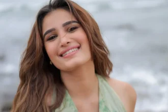 Rasha Thadani wearing a sage-green resort outfit by the Bay of Bengal in Visakhapatnam