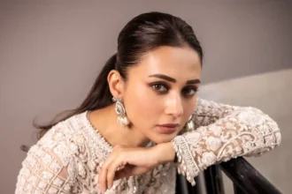 Mimi Chakraborty wearing an embellished pearl ivory sharara ensemble