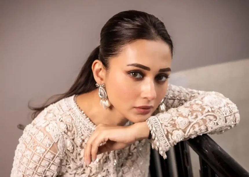 Mimi Chakraborty wearing an embellished pearl ivory sharara ensemble