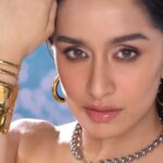 Shraddha Kapoor showcasing natural skin and her signature forehead mole in a beauty portrait