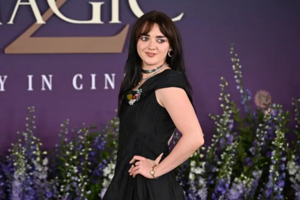 Maisie Williams wearing Sandra Bullock's archival black gown during the Practical Magic 2 press tour in London