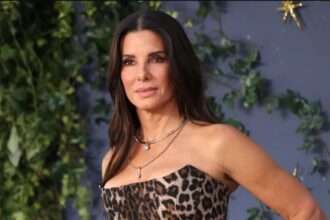 Sandra Bullock wearing a leopard-print strapless corset dress at the Practical Magic 2 London premiere