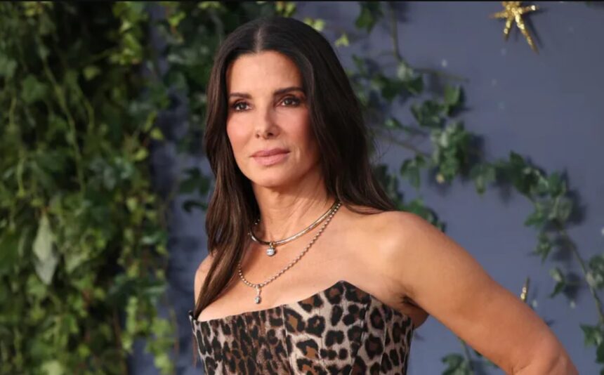 Sandra Bullock wearing a leopard-print strapless corset dress at the Practical Magic 2 London premiere