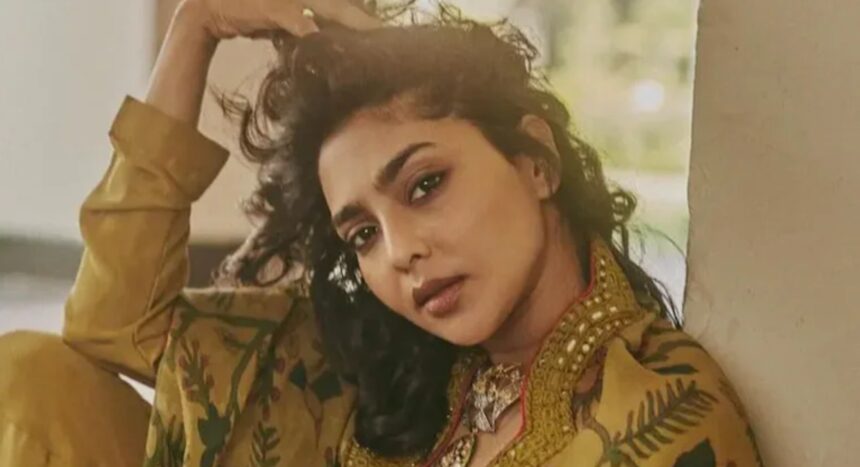 Aishwarya Lekshmi and Dulquer Salmaan in King of Kotha