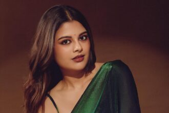 Sanjana AK in an emerald green saree styled by Deekshita Nikkam