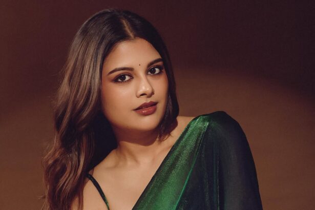 Sanjana AK in an emerald green saree styled by Deekshita Nikkam