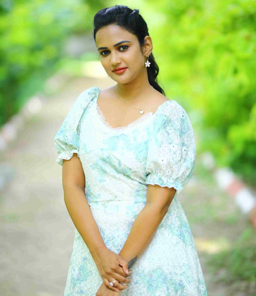 Ariyana Glory’s Powder-Blue Lace Dress Steals the Show