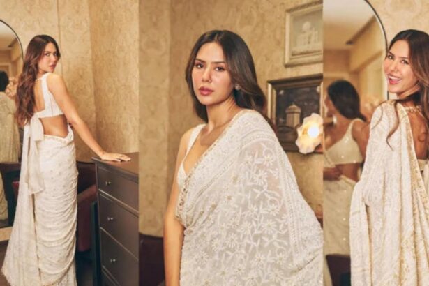 Sonam Bajwa wearing ivory chikankari saree with sleeveless blouse and statement earrings