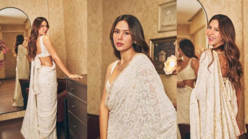 Sonam Bajwa wearing ivory chikankari saree with sleeveless blouse and statement earrings