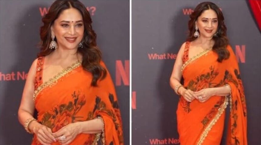 Madhuri Dixit in vibrant orange saree at Netflix India 2026 event