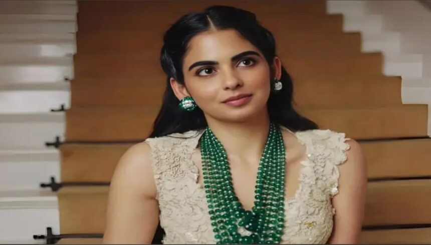 Hunterfly 2026 02 14 221818 Isha Ambani wearing an emerald-studded Anamika Khanna couture ensemble in antique gold tones