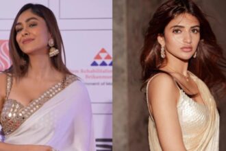 Sreeleela wearing ivory georgette saree with shell embroidered blouse