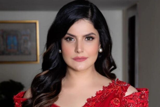 Zareen Khan performing goblet squats in gym