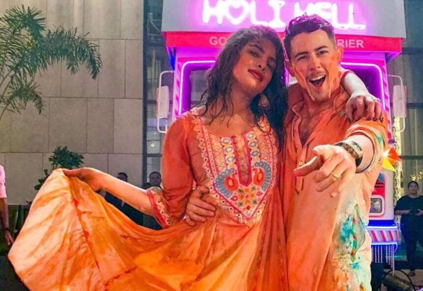 Nick Jonas and Priyanka Chopra celebrating Holi covered in colours