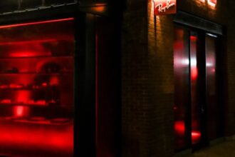 Interior of Ray-Ban House SoHo featuring eyewear displays with lifestyle decor and lounge setup