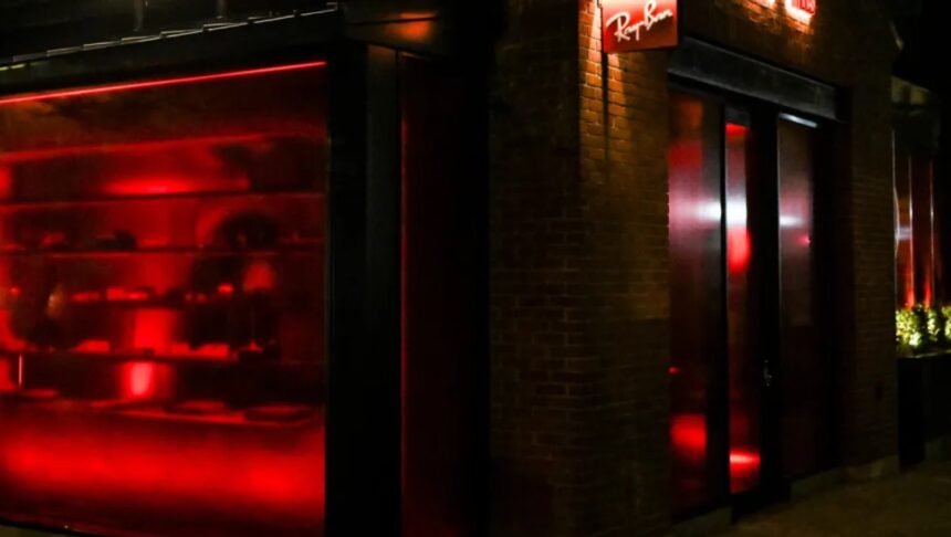 Interior of Ray-Ban House SoHo featuring eyewear displays with lifestyle decor and lounge setup