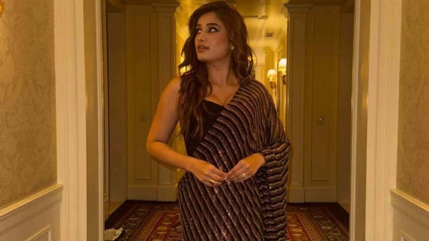 Rasha Thadani Black Shimmery Saree Look