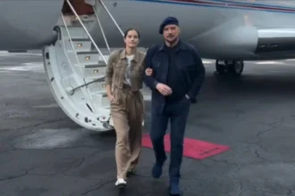 John Travolta piloting his private plane en route to Cannes Film Festival with daughter Ella Bleu