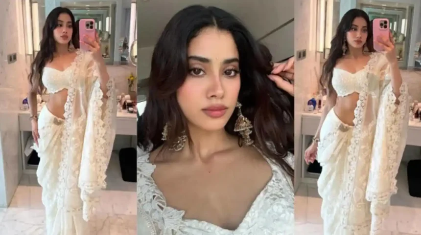 Hunterfly 26 05 30 210839 11zon Janhvi Kapoor wearing an ivory embroidered Anamika Khanna saree with cape-style pallu