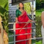 Woman wearing a perfectly pleated saree with neat draping and elegant styling