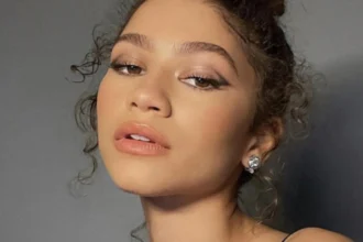 Hunterfly 026 06 26 182545 Zendaya wearing a vintage Spider-Man T-shirt styled as a dress during a Paris appearance