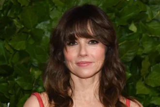 Actress Linda Cardellini attending a public event with a focus on her personal life and family
