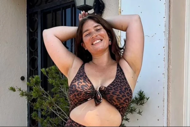 French model Clémentine Desseaux confidently posing in beachwear promoting body positivity message