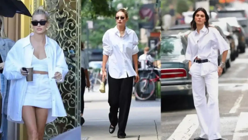 Woman styling oversized white shirt with tailored trousers, belt, and summer accessories for chic summer fashion look