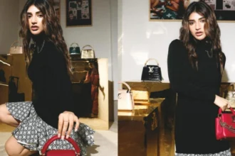 Hunterfly 2026 06 25 163854 Sreeleela wearing a black Louis Vuitton mini dress with a red handbag at a luxury fashion event