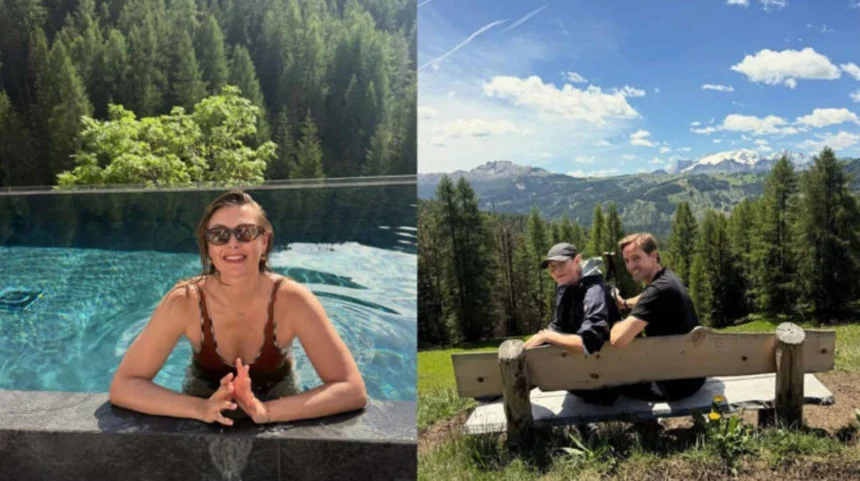 Hunterfly 2026 06 29 141857 Maria Sharapova relaxing in infinity pool during Italian Alps vacation with scenic mountain backdrop