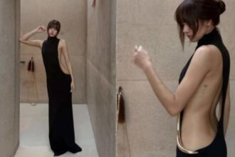 BLACKPINK member Lisa wearing a backless black gown during her Utah desert trip