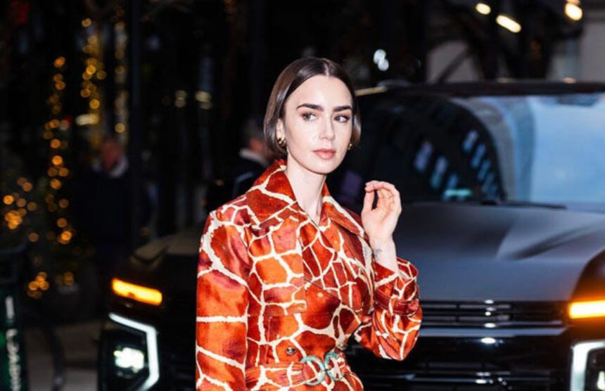 Fashion model showcasing maximalist style with layered jewellery, vibrant colors and mixed prints