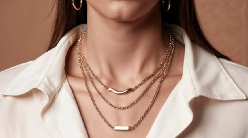 Elegant layered gold and silver necklaces styled with modern fashion outfits