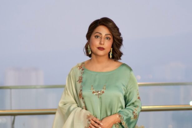 Hina Khan wearing a mint green embroidered ethnic outfit during a fashion photoshoot.