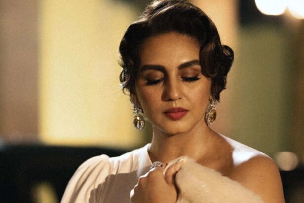 Huma Qureshi smiling during a promotional event as the Toxic team wishes her a happy birthday.