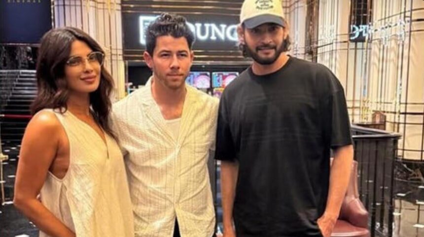 Priyanka Chopra, Nick Jonas and Mahesh Babu pose together during a movie night at AMB Cinemas in Hyderabad.