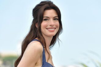 Hunterfly 07 03 171038 Anne Hathaway reacting on TikTok after learning she wore a red designer jumpsuit backwards.