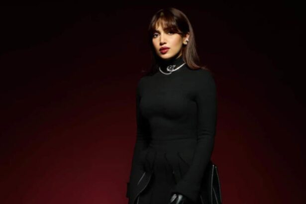 Hunterfly 07 18 175725 Bhumi Pednekar wearing a stylish black designer outfit showcasing her bold and contemporary fashion sense.
