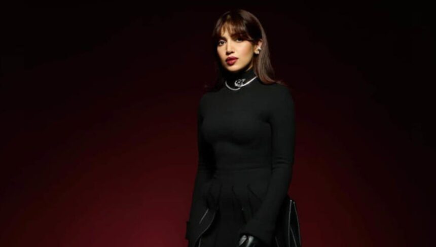 Hunterfly 07 18 175725 Bhumi Pednekar wearing a stylish black designer outfit showcasing her bold and contemporary fashion sense.