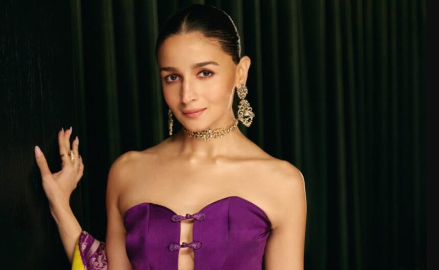 Hunterfly 07 21 112823 Alia Bhatt wearing a jade green Rajiramniq kurta set during wedding festivities, styled with gold chandbali earrings and minimal makeup