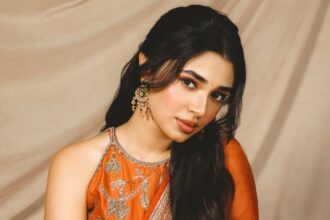 Hunterfly 2026 07 12 095420 Krithi Shetty wearing a rust-orange ethnic ensemble with gold embroidery