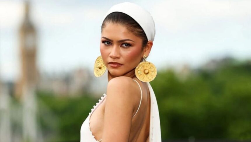Zendaya wearing ancient Iranian gold disc earrings at The Odyssey event in London