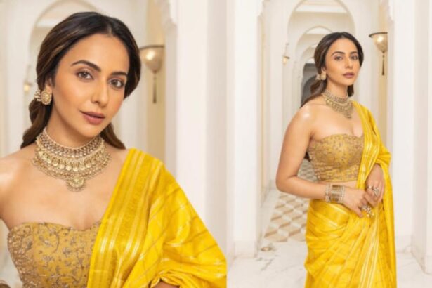 Rakul Preet Singh wearing a yellow silk saree with kundan jewellery at the Ramayana promotional event in New Delhi